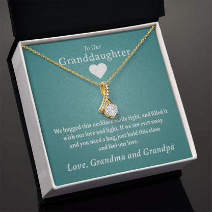 To Our Granddaughter - Feel Our Love ( Grandma and Grandpa) | Stainless Steel and Gold Ribbon Necklace