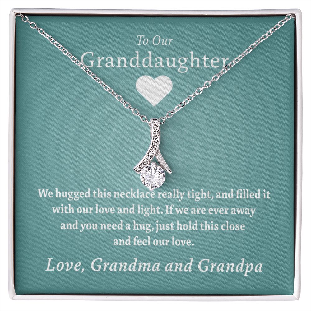 To Our Granddaughter - Feel Our Love ( Grandma and Grandpa) | Stainless Steel and Gold Ribbon Necklace