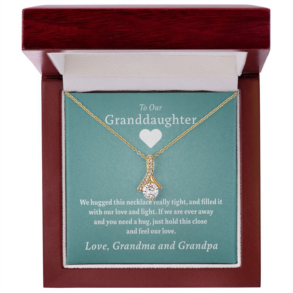 To Our Granddaughter - Feel Our Love ( Grandma and Grandpa) | Stainless Steel and Gold Ribbon Necklace