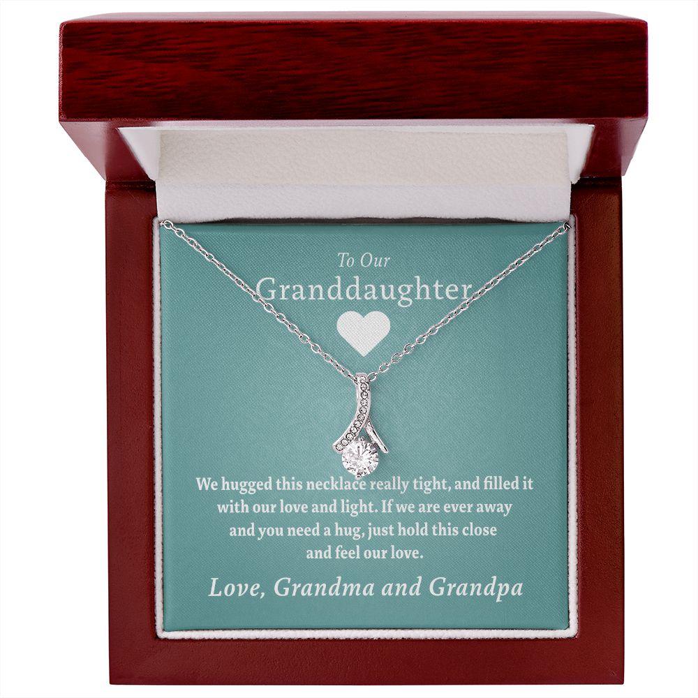 To Our Granddaughter - Feel Our Love ( Grandma and Grandpa) | Stainless Steel and Gold Ribbon Necklace
