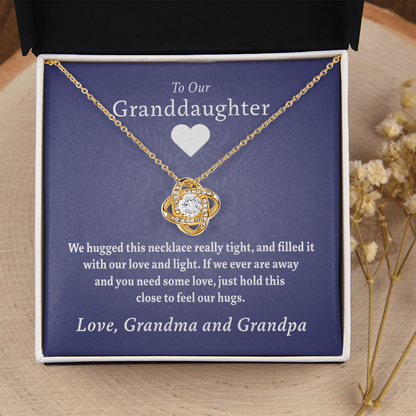 To Our Granddaughter (From Grandma & Grandpa) - Hugged This Tight Purple Card  | Gold and Stainless Steel Knot Necklace