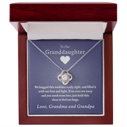 To Our Granddaughter (From Grandma & Grandpa) - Hugged This Tight Purple Card  | Gold and Stainless Steel Knot Necklace